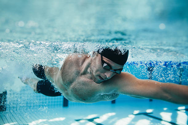 Masters swimmer mid-race